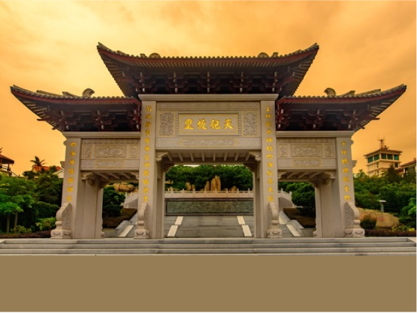 Tianfei Hometown Heritage Park archway at sunset.